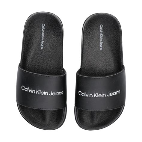 black calvin klein sliders.